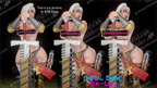 Three warrior figurines with armor and weapons on a dark background